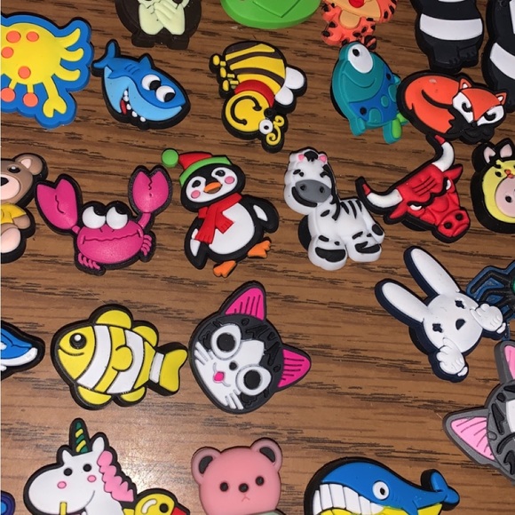 Croc charms $1 each. Comment below which ones you want and I will send them. - Picture 7 of 12